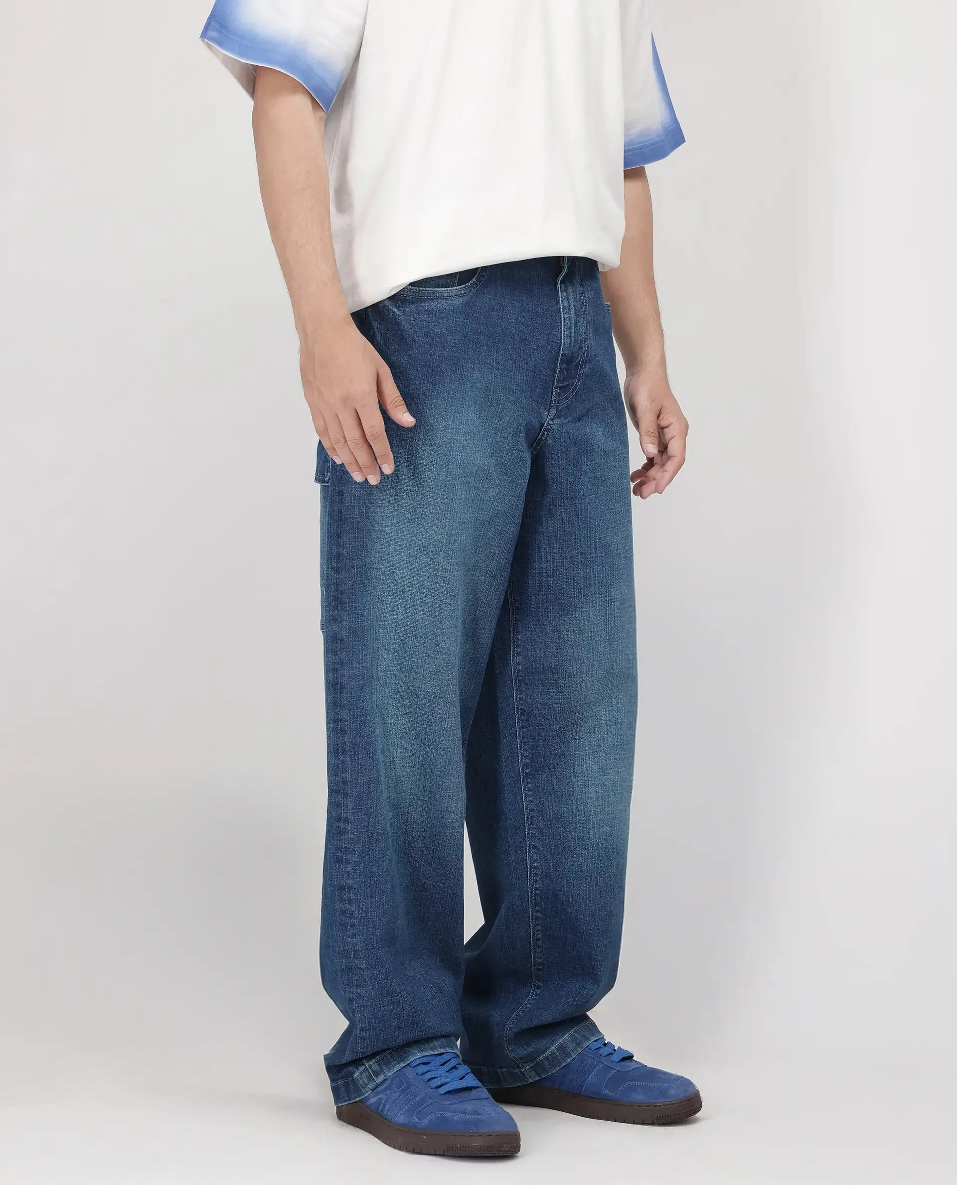 Rare Rabbit Men Jace Blue Cotton Blend Fabric Button And Zip Closure Baggy Fit Plain Jeans