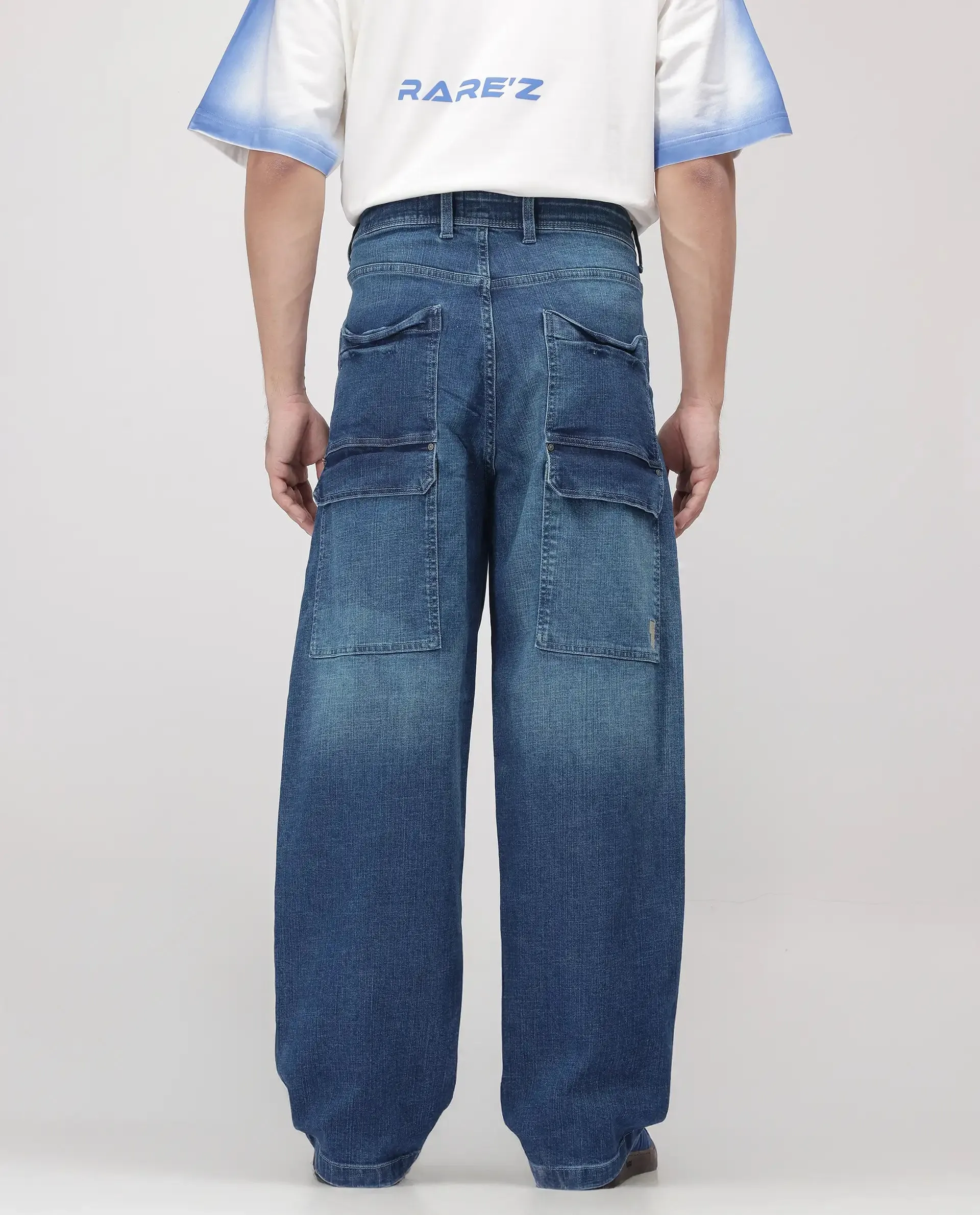 Rare Rabbit Men Jace Blue Cotton Blend Fabric Button And Zip Closure Baggy Fit Plain Jeans