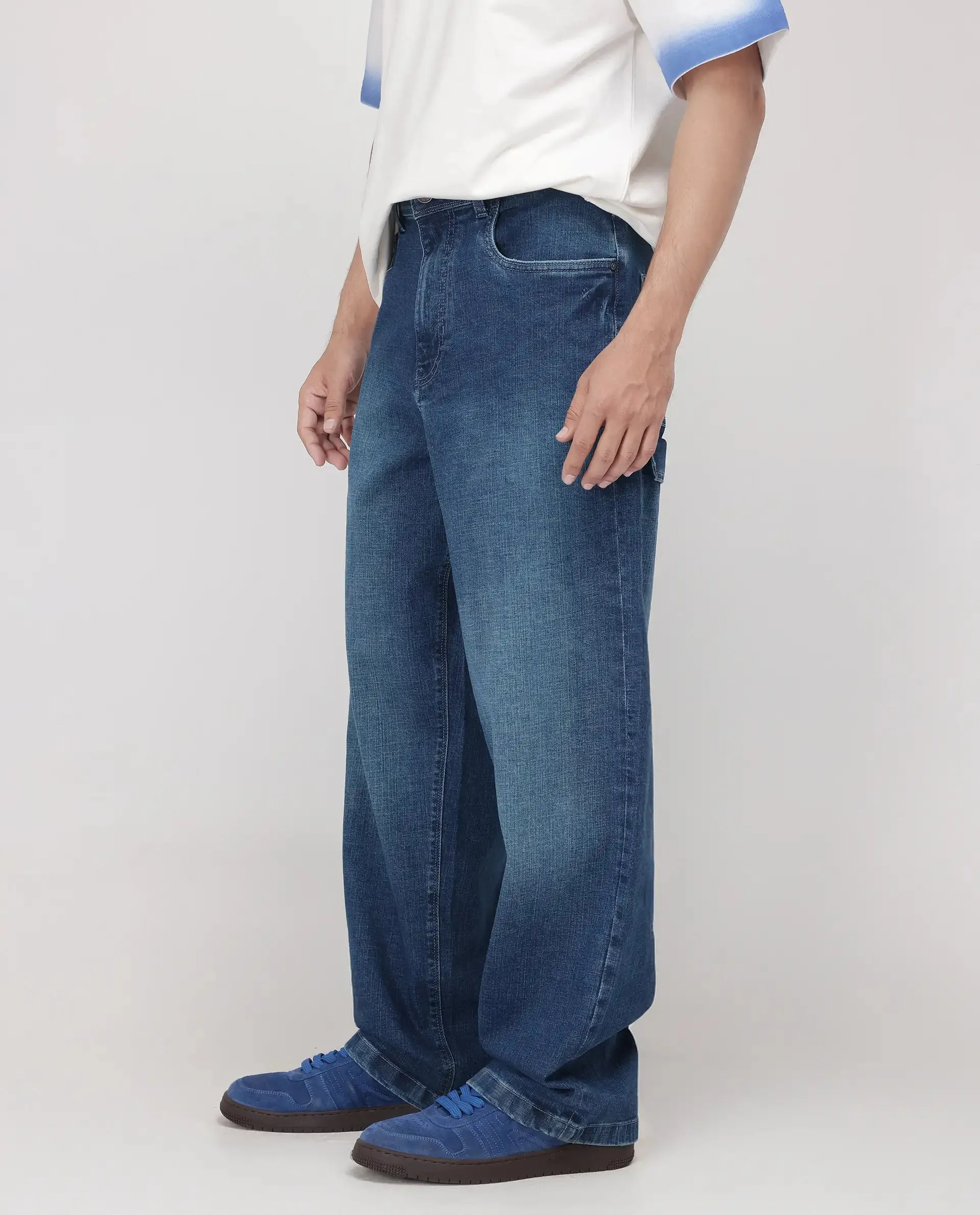 Rare Rabbit Men Jace Blue Cotton Blend Fabric Button And Zip Closure Baggy Fit Plain Jeans